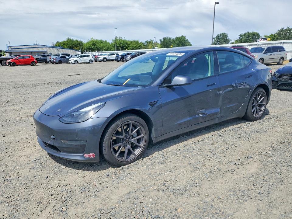 2023 Tesla Model 3 VIN 5YJ3E1EA9PF590524 — COPART salvage auction photo