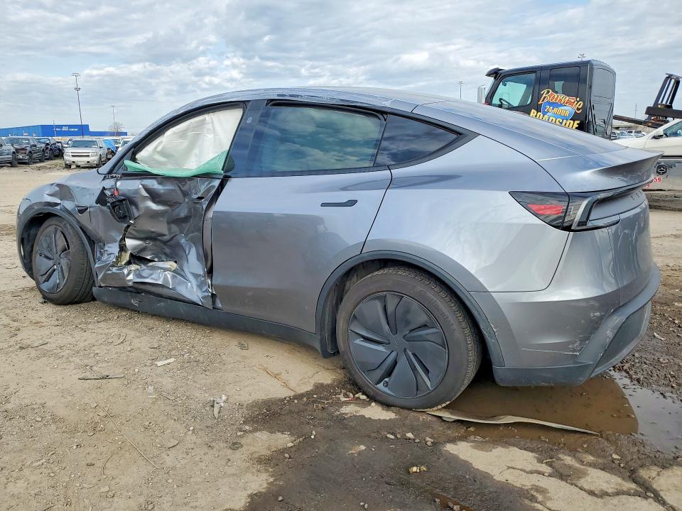 2026 Tesla Model y VIN 7SAYGDEE2TF425111 COPART salvage auction — SIDE, MI - CERT OF TITLE-SALVAGE VEHICLE, sold $19,200 on 2026-07-07 (photo 2)