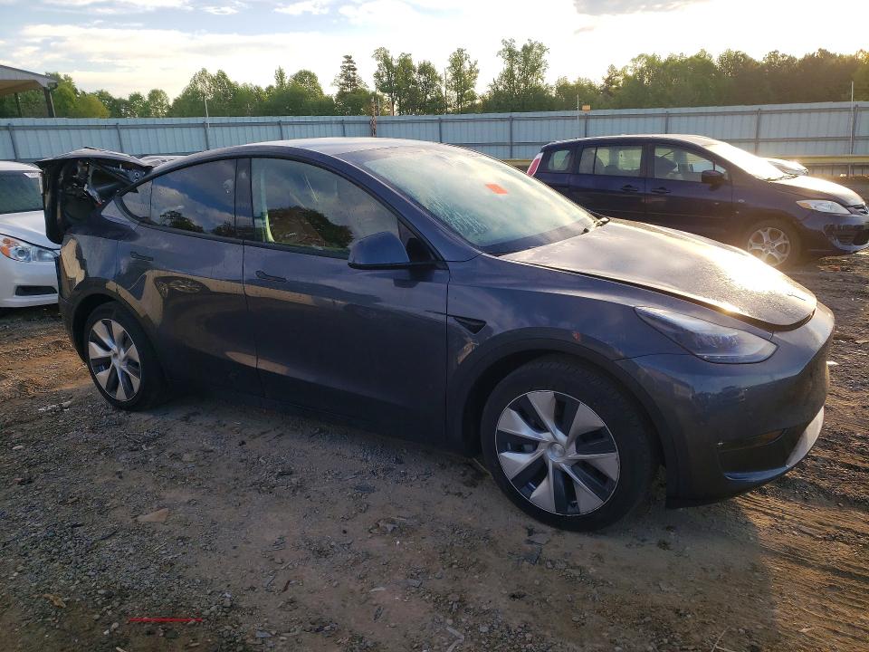 2023 Tesla Model y VIN 7SAYGAEE5PF606224 COPART salvage auction — REAR END, Va - Cert Of Title - Salvage, sold $12,800 on 2026-07-10 (photo 4)