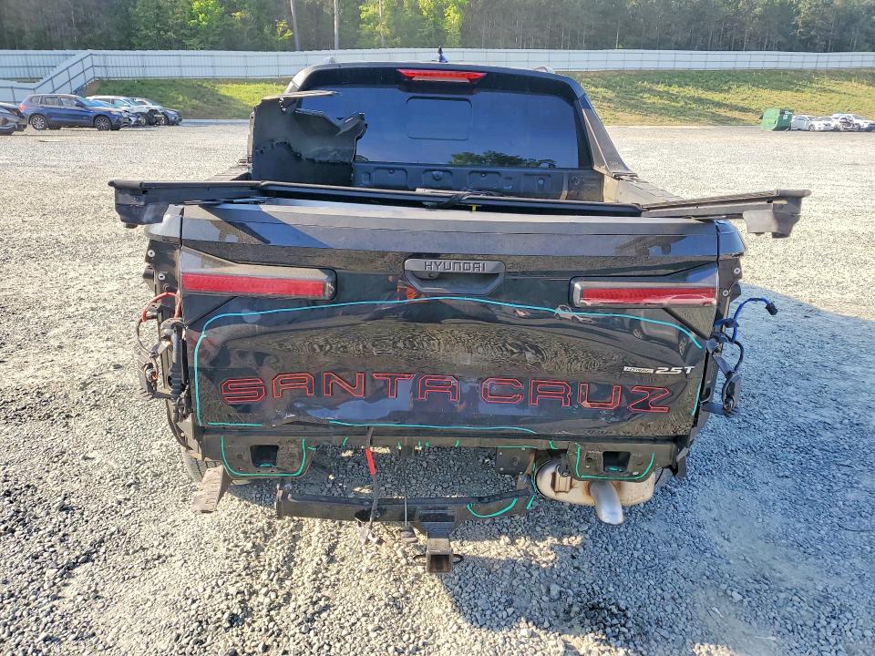 2023 Hyundai Santa cruz VIN 5NTJDDAF8PH062389 COPART salvage auction — REAR END, NC - SALVAGE CERTIFICATE OF TITLE, sold $5,400 on 2026-07-23 (photo 6)