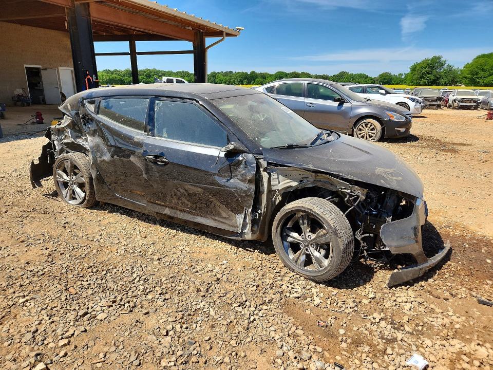 2017 Hyundai Veloster VIN KMHTC6ADXHU324386 COPART salvage auction — ALL OVER, AL - CERT OF TITLE-SALVAGE TITLE, sold $500 on 2026-07-08 (photo 4)