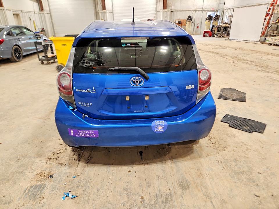 2012 Toyota Prius c VIN JTDKDTB31C1515352 COPART salvage auction — SIDE, Wi - Junked Vehicle Bill Of Sale, sold $650 on 2026-07-08 (photo 6)