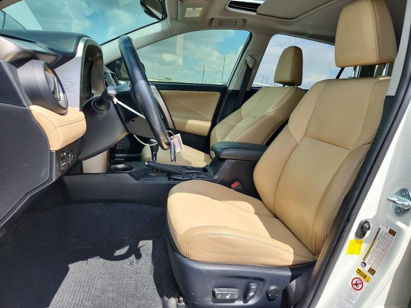 2014 Toyota Rav 4 VIN JTMYFREV4EJ018819 COPART salvage auction — SIDE, Tx - Salvage Vehicle Title, sold $2,150 on 2026-07-28 (photo 7)