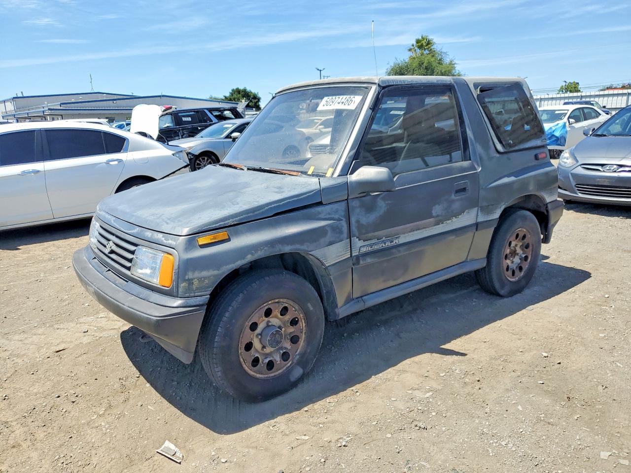 1989 Suzuki Sidekick VIN JS3TA01C5K4112583 COPART salvage auction — Minor Dent/Scratches, Dv - Clean Title, sold $1,350 on 2026-09-11 (photo 1)