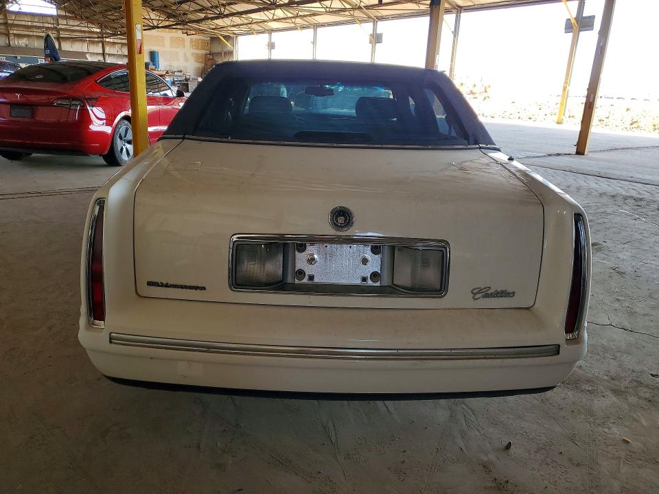1998 Cadillac Deville VIN 1G6KD54Y8WU757906 COPART salvage auction — FRONT END, AZ - CERT OF TITLE - SALVAGE, sold $200 on 2026-08-17 (photo 6)