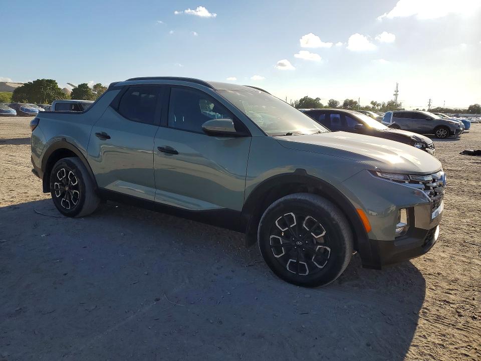 2023 Hyundai Santa cruz VIN 5NTJCDAE8PH040676 COPART salvage auction — SIDE, Fl - Cert Of Title Slvg Rebuildable, sold $9,200 on 2026-07-09 (photo 4)