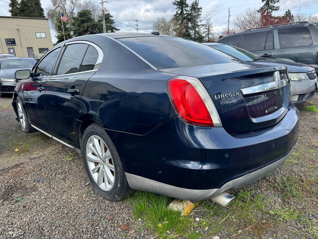 2009 Lincoln MKS VIN 1LNHM94RX9G608922 COPART salvage auction — Vandalized, OR - SALVAGE TITLE CERTIFICATE (P), sold $2,300 on 2026-05-18 (photo 3)