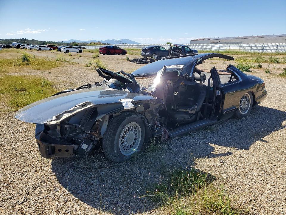 1995 Lincoln Mark series VIN 1LNLM91V4SY760187 COPART salvage auction — ALL OVER, Ca - Dis/Dlr/Exp Lien Papers-Salv, sold $50 on 2026-07-08 (photo 1)