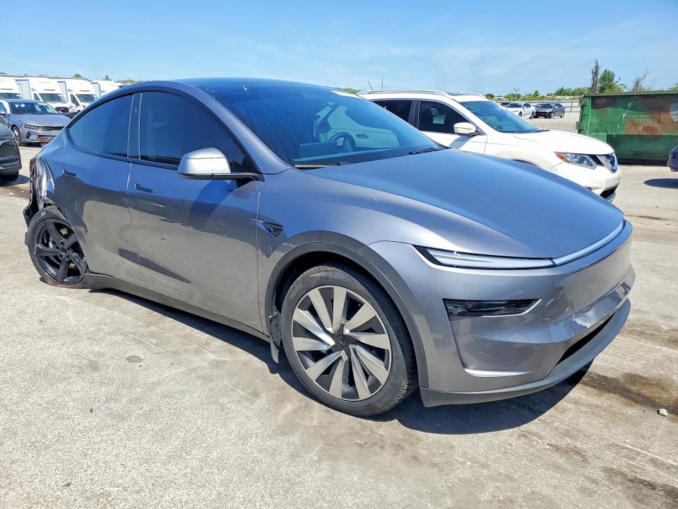 2026 Tesla Model y VIN 7SAYGDED1TA430045 COPART salvage auction — REAR END, Fl - Cert Of Title Slvg Rebuildable, sold $20,100 on 2026-07-15 (photo 4)