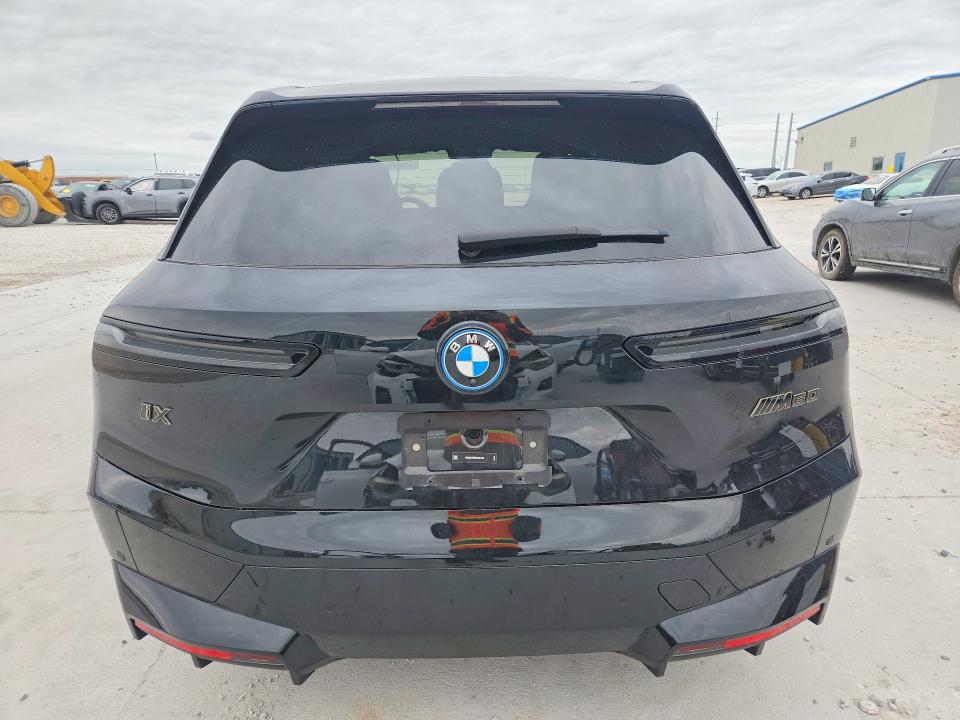 2025 BMW Ix VIN WB533CF00SCT39190 COPART salvage auction — SIDE, Tx - Certificate Of Title, sold $28,250 on 2026-07-28 (photo 6)