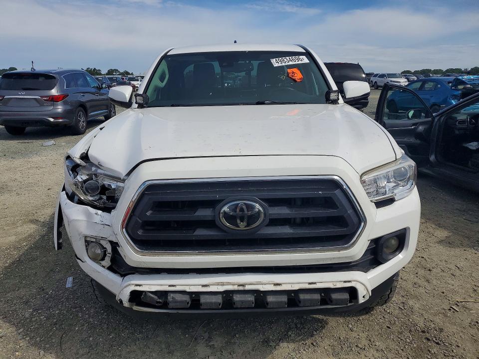 2020 Toyota Tacoma VIN 3TYRZ5CNXLT001938 COPART salvage auction — REAR END, Ca - Salvage Certificate, sold $4,700 on 2026-07-02 (photo 5)
