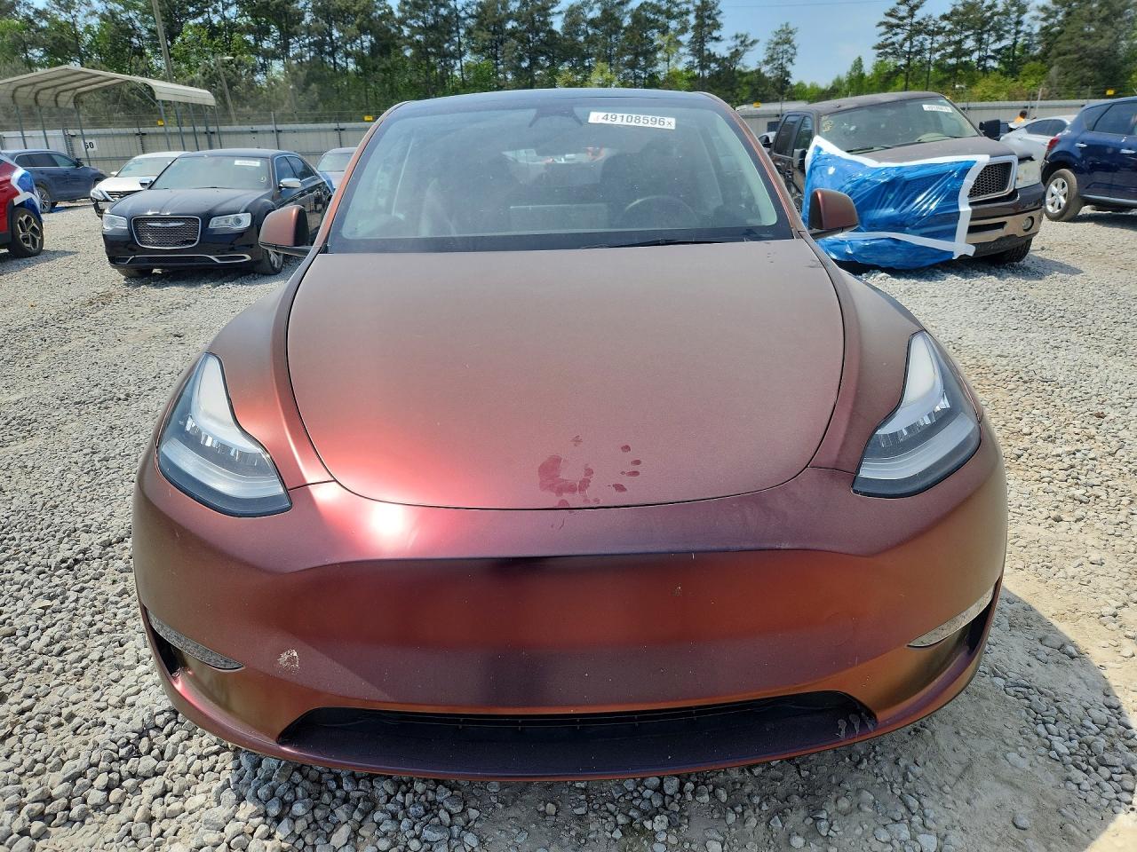 2023 Tesla Model Y VIN 7SAYGDEE8PA026125 COPART salvage auction — Rear End, GA - CERT OF TITLE-SALVAGE, sold $8,000 on 2026-06-30 (photo 5)