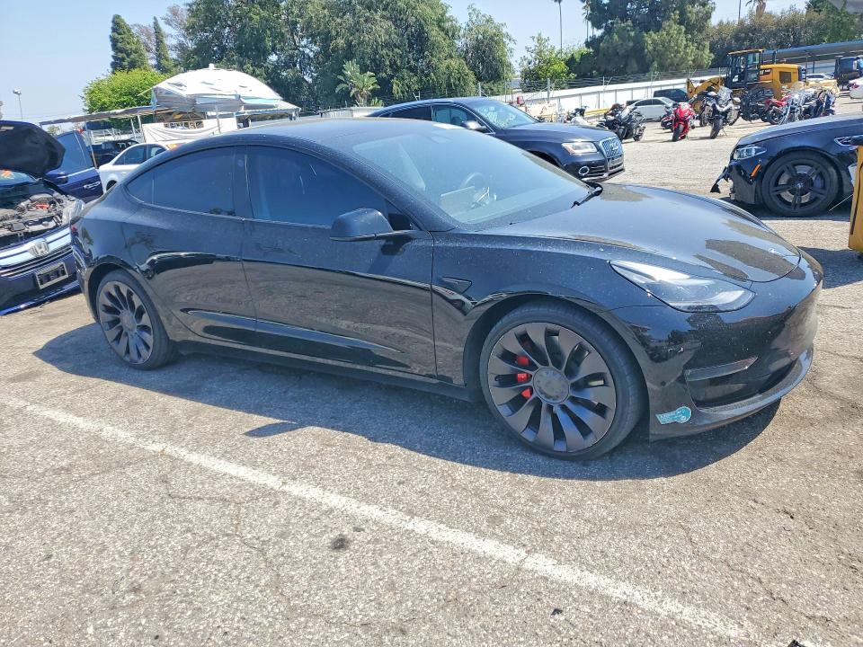 2023 Tesla Model 3 VIN 5YJ3E1EC2PF693821 COPART salvage auction — SIDE, CA - SALVAGE CERTIFICATE, sold $11,800 on 2026-07-31 (photo 4)