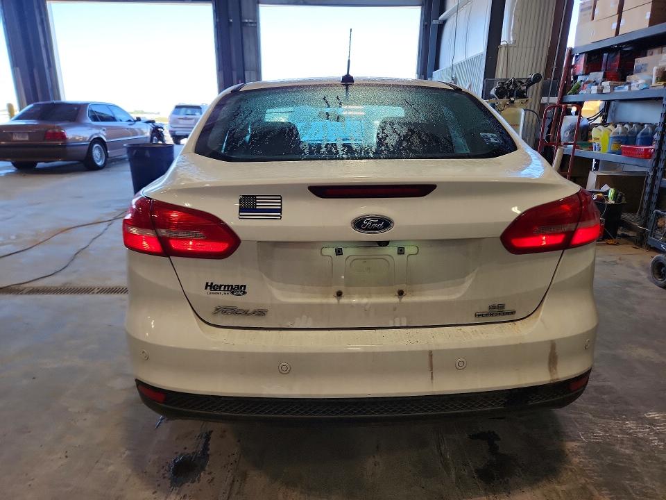 2016 Ford Focus VIN 1FADP3F27GL282188 COPART salvage auction — SIDE, Mn - Cert Of Title-Prior Salvage, sold $575 on 2026-07-09 (photo 6)