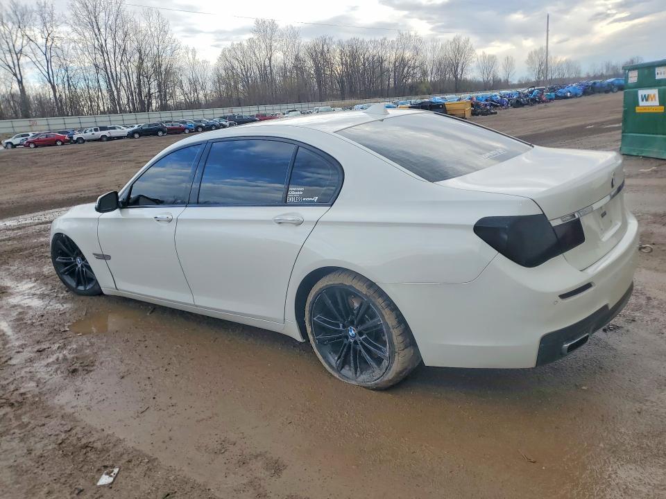 2014 BMW 7 series VIN WBAYE8C59ED135551 COPART salvage auction — UNDERCARRIAGE, Mi - Certificate Of Title, sold $1,650 on 2026-07-22 (photo 2)
