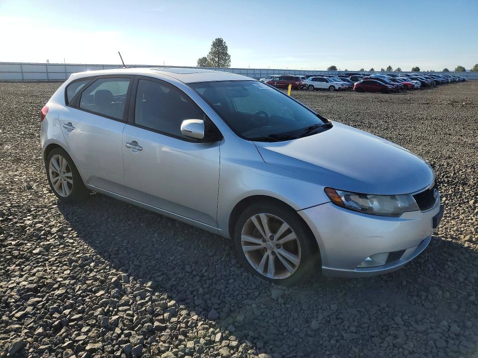 2011 Kia Forte VIN KNAFW5A32B5330028 COPART salvage auction — MINOR DENT/SCRATCHES, Tx - Salvage Vehicle Title, sold $525 on 2026-07-08 (photo 4)