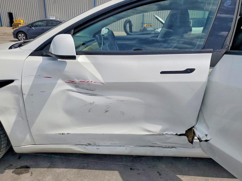 2023 Tesla VIN 5YJ3E1EA5PF558721 COPART salvage auction — SIDE, Fl - Certificate Of Destruction, sold $7,800 on 2026-07-15 (photo 7)