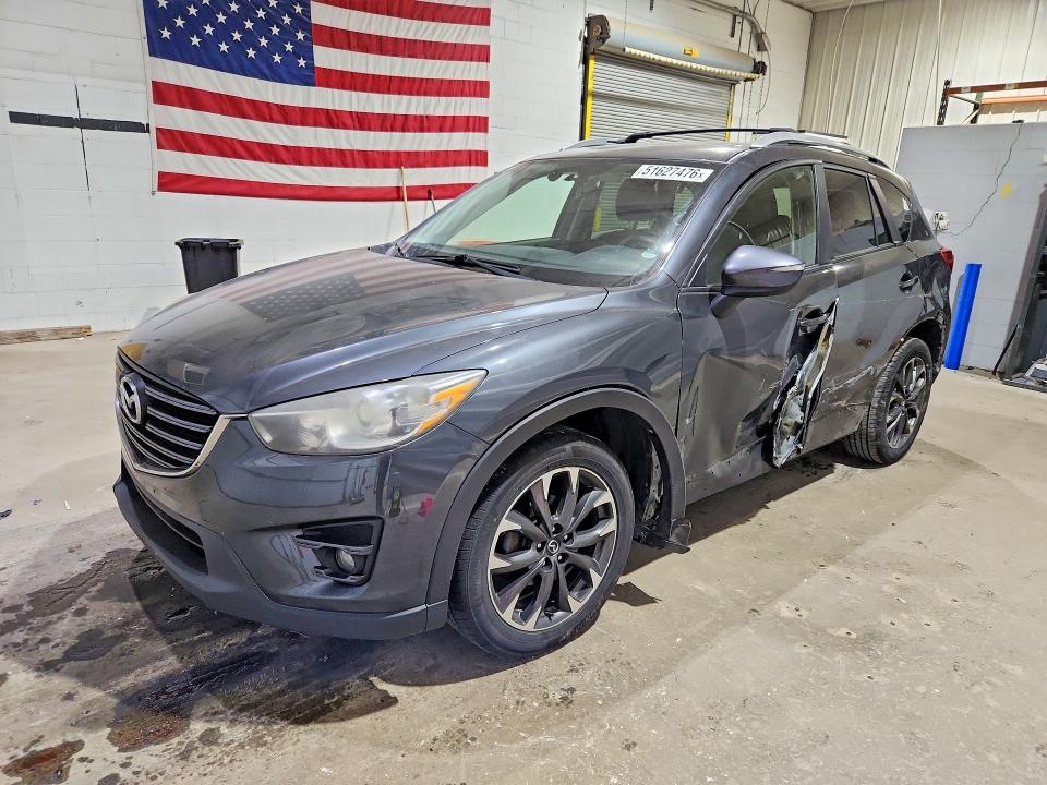 2016 Mazda Cx-5 VIN JM3KE4DY1G0795935 COPART salvage auction — SIDE, Nh - Cert Of Title-Salvage, sold $2,200 on 2026-07-28 (photo 1)