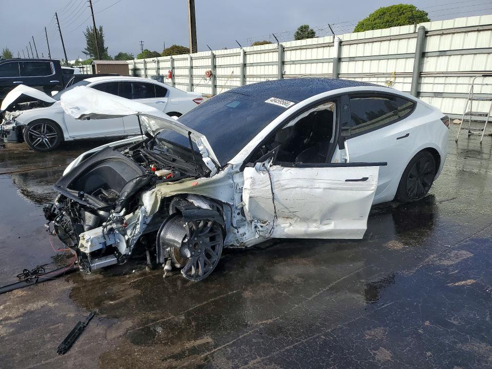 2025 Tesla Model 3 VIN 5YJ3E1EA5SF027799 COPART salvage auction — FRONT END, FL - CERTIFICATE OF DESTRUCTION, sold $5,600 on 2026-07-02 (photo 1)