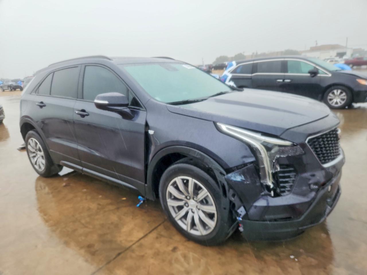 2022 Cadillac XT4 VIN 1GYFZER43NF122966 COPART salvage auction — Front End, TX - CERTIFICATE OF TITLE, sold $6,100 on 2026-07-09 (photo 4)