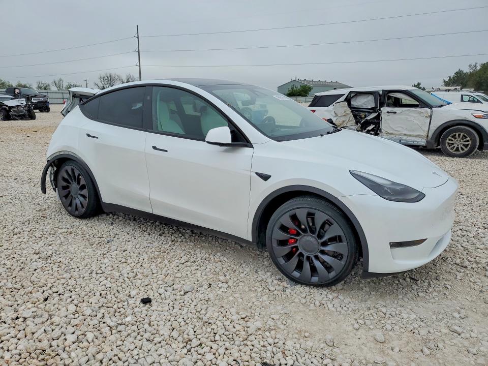2024 Tesla Model y VIN 7SAYGDEF1RA275099 COPART salvage auction — REAR END, Tx - Salvage Vehicle Title, sold $12,400 on 2026-07-16 (photo 4)