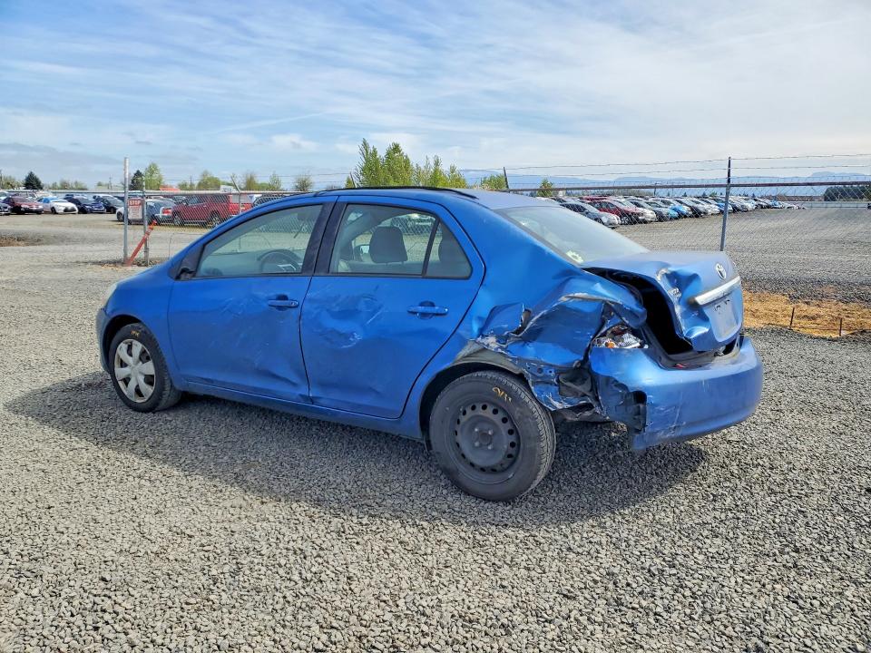 2010 Toyota Yaris VIN JTDBT4K36A4064150 COPART salvage auction — REAR END, Or - Salvage Title Certificate, sold $200 on 2026-07-07 (photo 2)