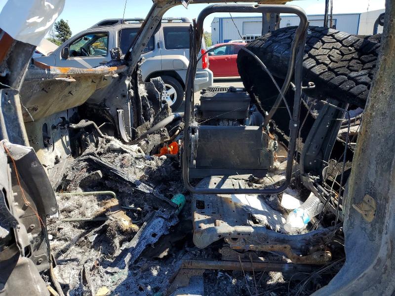 2018 Jeep Wrangler / VIN 1C4HJXDN1JW252580 COPART salvage auction — BURN, Ca - Non-Repairable Vehicle Cert, sold $800 on 2026-07-10 (photo 7)
