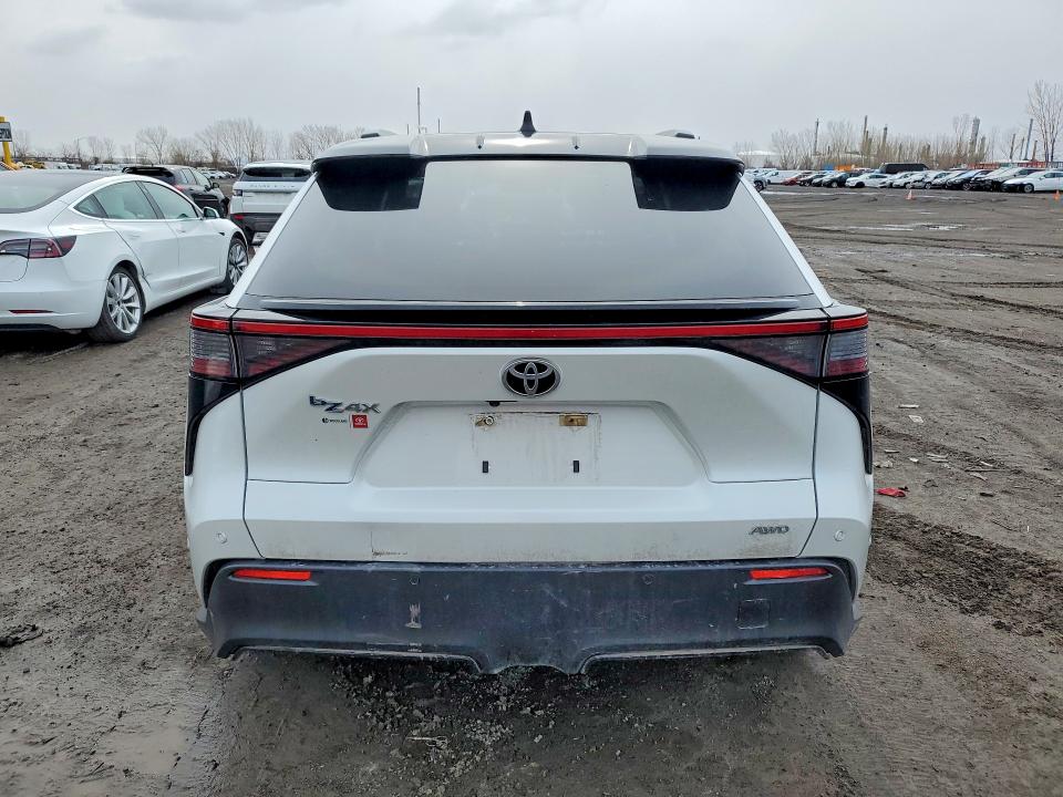 2023 Toyota Bz4x VIN JTMABACA5PA019138 COPART salvage auction — FRONT END, Qc - Gravement Accidente, sold $6,100 on 2026-07-14 (photo 6)