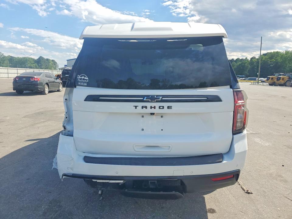 2023 Chevrolet Tahoe VIN 1GNSKPKDXPR263914 COPART salvage auction — REAR END, Nc - Salvage Certificate Of Title, sold $14,700 on 2026-08-27 (photo 6)