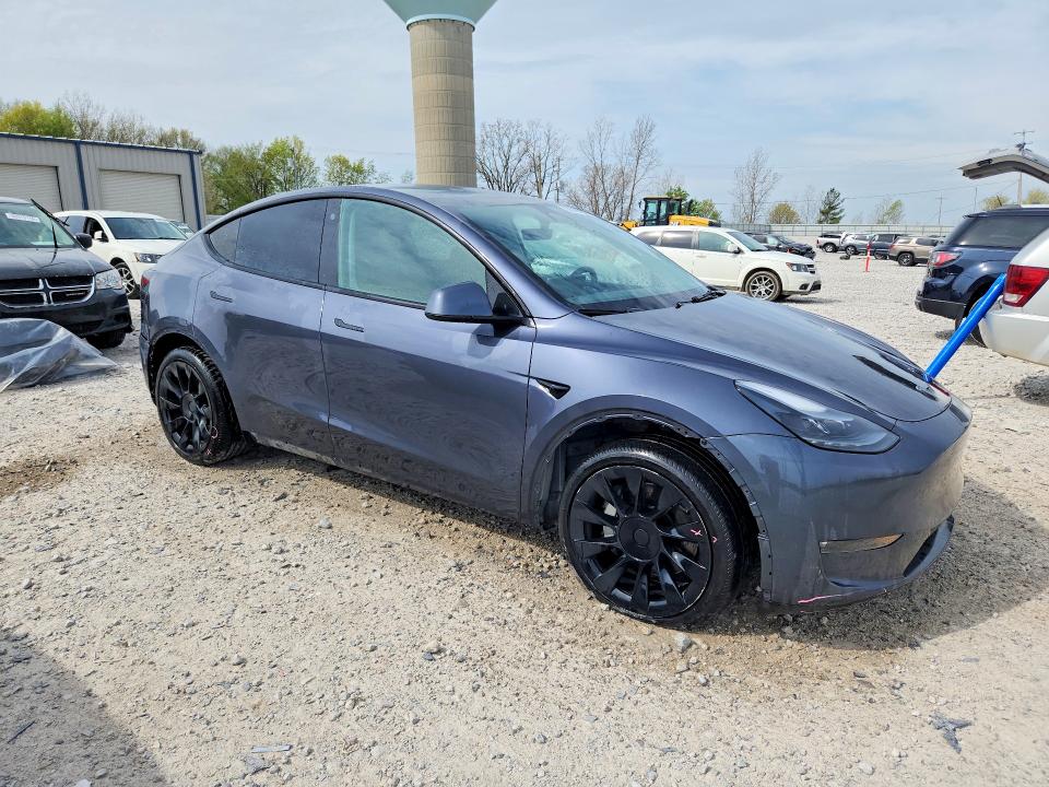 2023 Tesla Model y VIN 7SAYGDEE0PF695489 COPART salvage auction — FRONT END, MI, sold $13,800 on 2026-07-23 (photo 4)