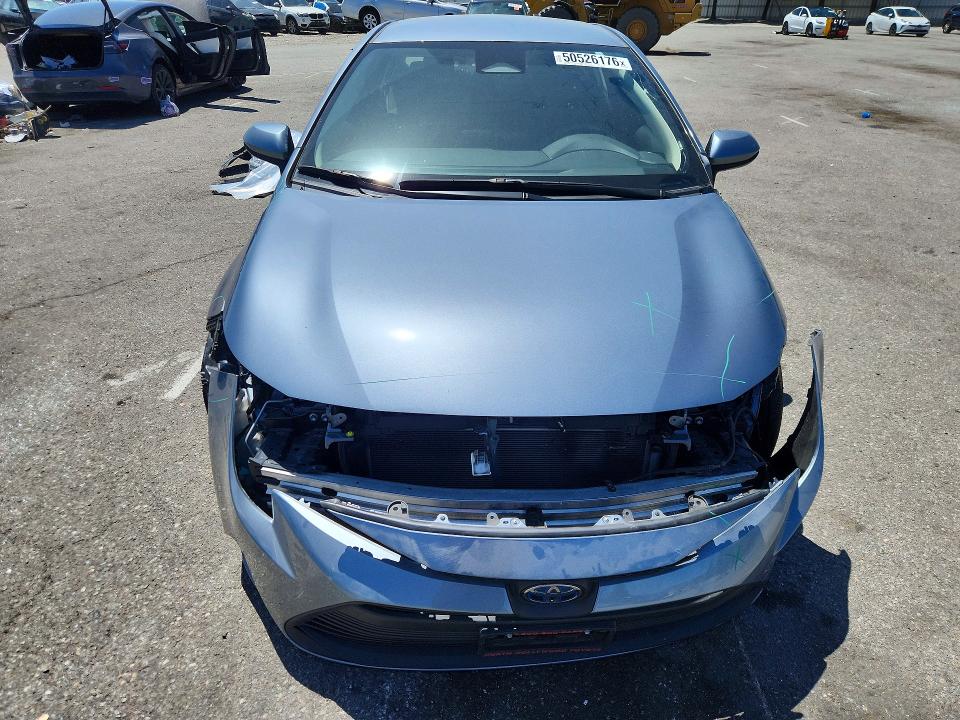 2023 Toyota Corolla VIN JTDBCMFE1PJ015556 COPART salvage auction — FRONT END, Ca - Salvage Certificate, sold $2,400 on 2026-07-21 (photo 5)