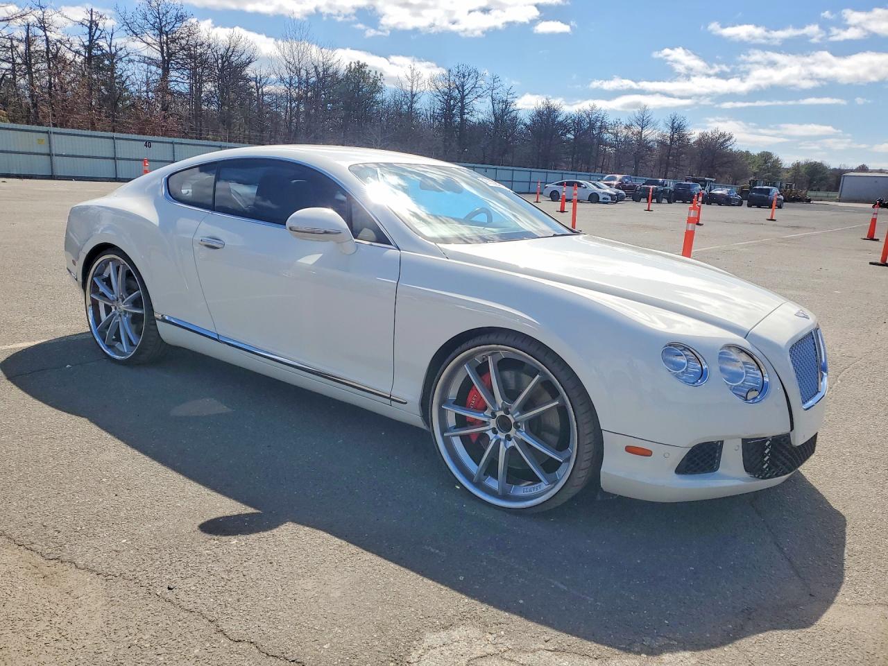 2012 Bentley Continental gt VIN SCBFR7ZAXCC071524 COPART salvage auction — Minor Dent/Scratches, NY - CERT OF TITLE-REBUILT SALVAGE (P), sold $17,000 on 2026-04-27 (photo 4)
