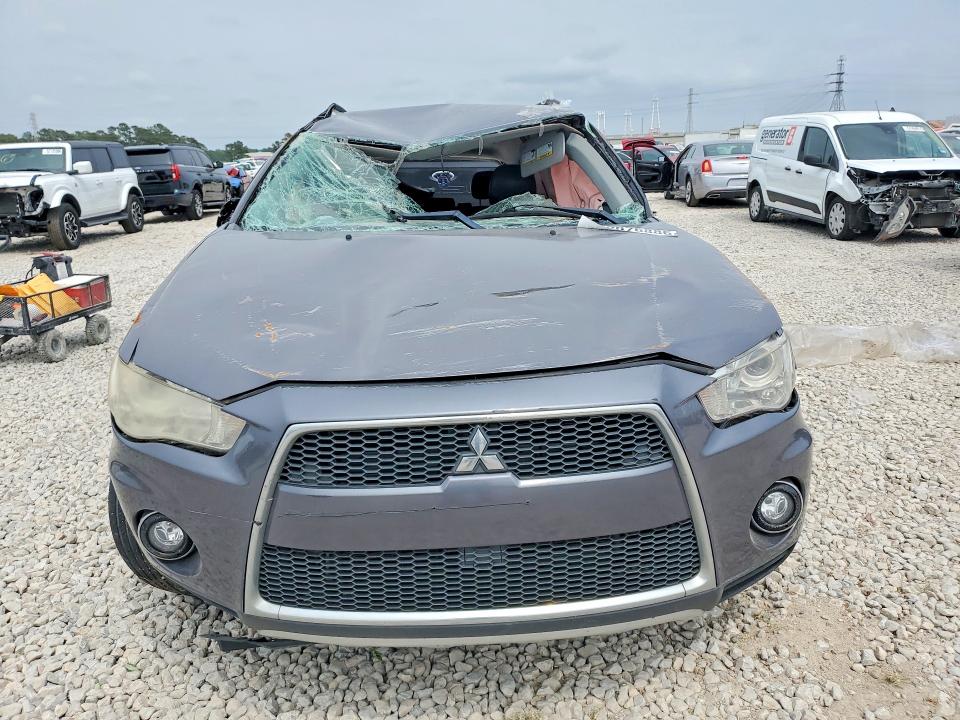 2010 Mitsubishi Outlander VIN JA4JT4AX3AZ002945 COPART salvage auction — ROLLOVER, Tx - Salvage Vehicle Title, sold $475 on 2026-07-07 (photo 5)