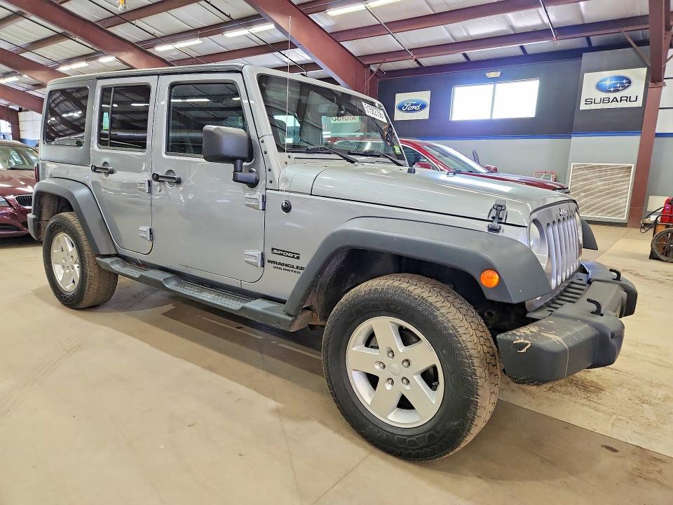 2013 Jeep Wrangler unlimited VIN 1C4BJWDGXDL699433 COPART salvage auction — MINOR DENT/SCRATCHES, Vt - Certificate Of Title, sold $5,900 on 2026-07-02 (photo 4)