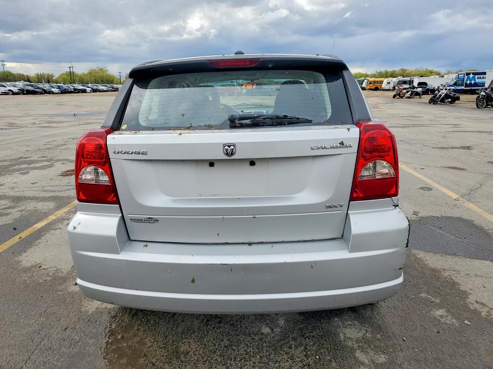2009 Dodge Caliber VIN 1B3HB48CX9D103274 COPART salvage auction — SIDE, Id - Salvage Certificate Of Title, sold $125 on 2026-07-09 (photo 6)