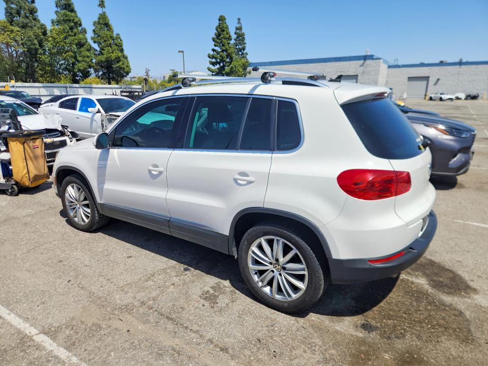 2014 Volkswagen Tiguan VIN WVGAV3AX4EW550496 COPART salvage auction — MECHANICAL, Fl - Derelict Vehicle Certificate (P), sold $4,100 on 2026-07-30 (photo 2)