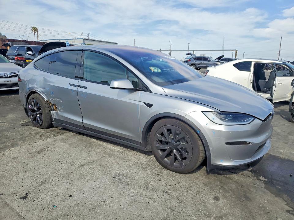 2024 Tesla VIN 7SAXCDE55RF458345 COPART salvage auction — SIDE, Ca - Salvage Certificate, sold $32,250 on 2026-07-15 (photo 4)