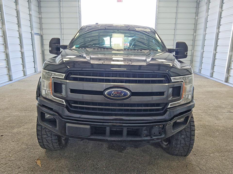 2018 Ford F-150 lightning VIN 1FTEW1CP3JFB51609 COPART salvage auction — MINOR DENT/SCRATCHES, FL - CERTIFICATE OF TITLE, sold $10,100 on 2026-07-09 (photo 5)