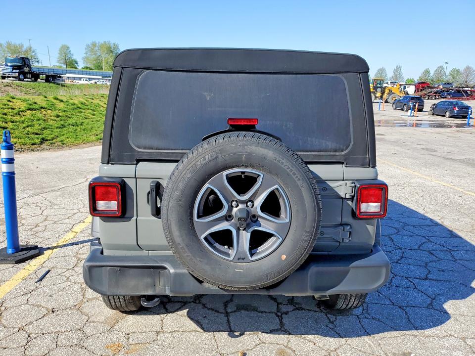 2023 Jeep Wrangler / VIN 1C4HJXDG5PW509413 COPART salvage auction — MINOR DENT/SCRATCHES, MO - CERTIFICATE OF TITLE, sold $1,150 on 2026-07-09 (photo 6)