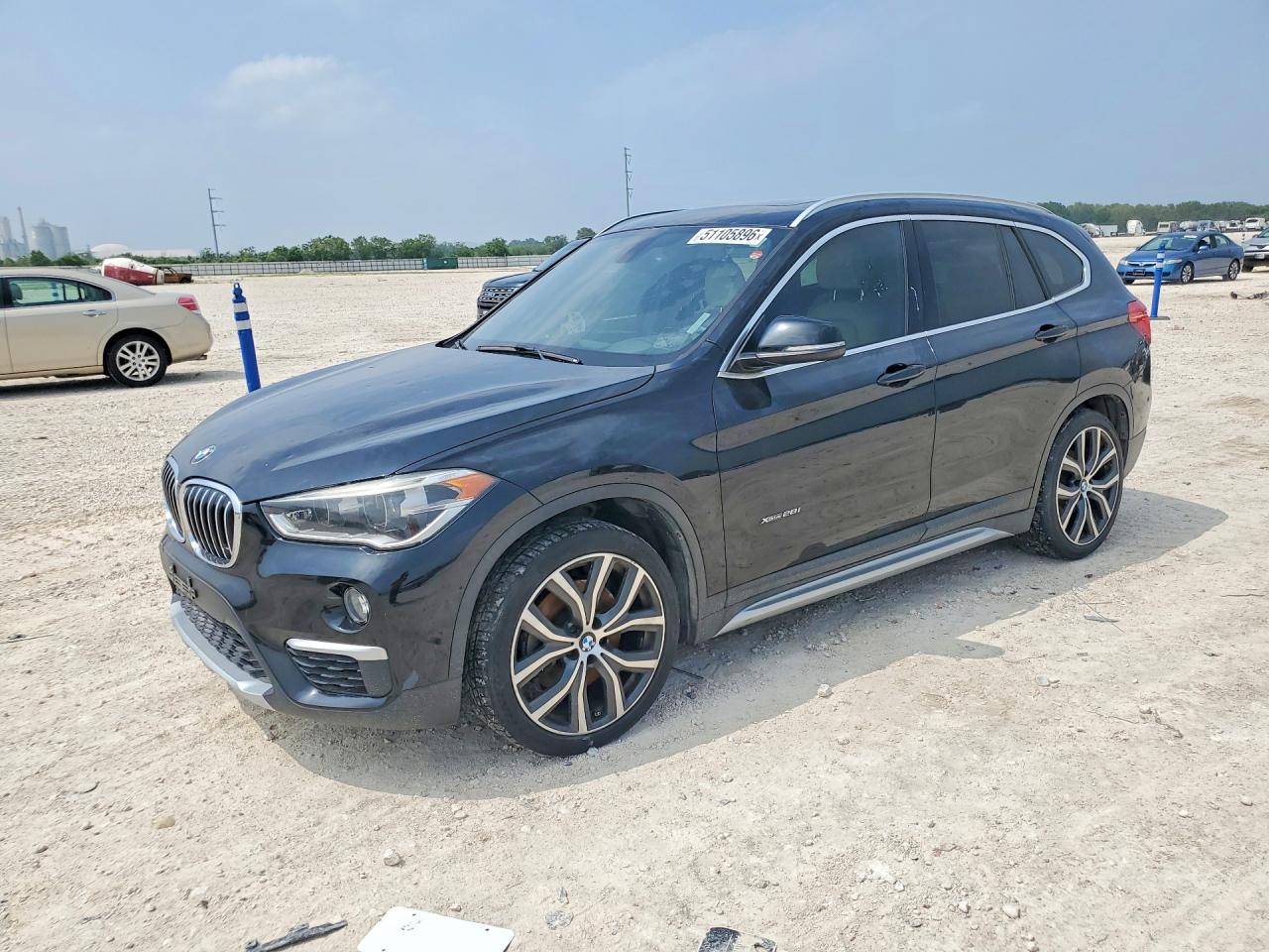 2017 BMW X1 VIN WBXHT3C35H5F75779 COPART salvage auction — Minor Dent/Scratches, TX - CERTIFICATE OF TITLE, sold $4,400 on 2026-07-09 (photo 1)