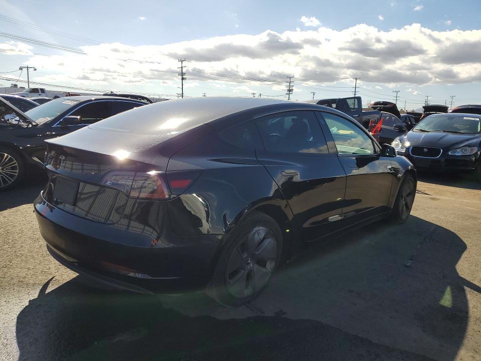 2023 Tesla Model 3 VIN 5YJ3E1EA8PF562228 COPART salvage auction — REAR END, Ca - Salvage Certificate, sold $6,000 on 2026-07-06 (photo 3)