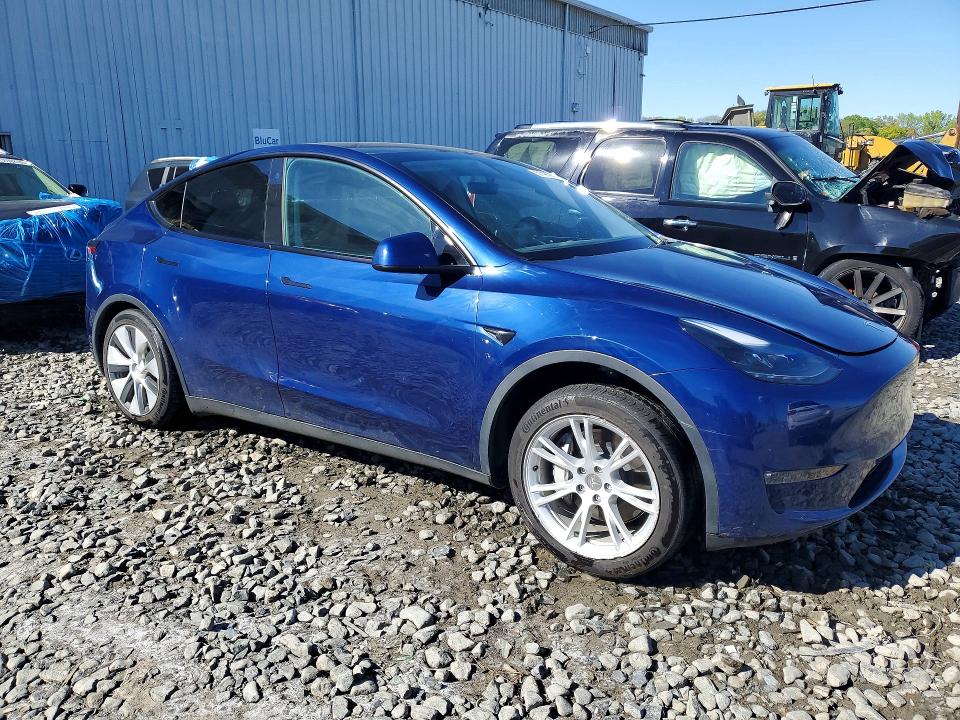 2023 Tesla Model y VIN 7SAYGAEE0PF774434 COPART salvage auction — SIDE, Nj - Cert Of Title-Salvage, sold $9,200 on 2026-07-29 (photo 4)