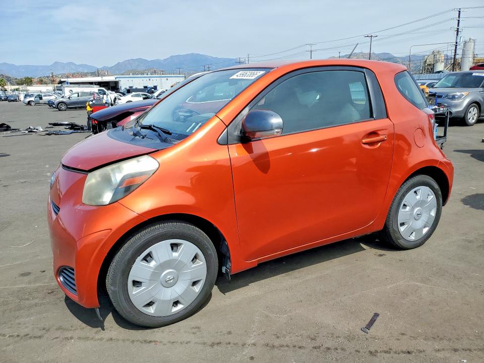 2012 Scion Iq VIN JTNJJXB04CJ010550 — COPART salvage auction photo