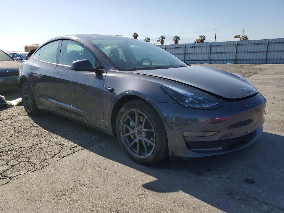 2023 Tesla Model 3 VIN 5YJ3E1EB2PF678193 COPART salvage auction — REAR END, Salvage Title, sold $9,600 on 2026-07-30 (photo 4)