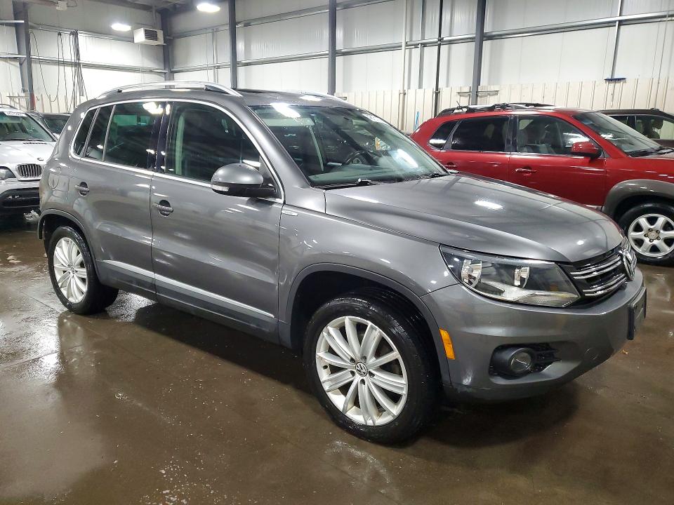 2013 Volkswagen Tiguan VIN WVGBV3AX2DW607748 COPART salvage auction — REAR END, Mn - Cert Of Title-Prior Salvage, sold $525 on 2026-07-09 (photo 4)