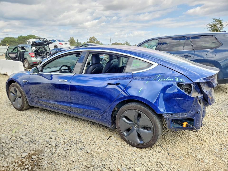 2018 Tesla Model 3 VIN 5YJ3E1EA9JF003021 COPART salvage auction — REAR END, Ca - Salvage Certificate, sold $4,550 on 2026-07-09 (photo 2)