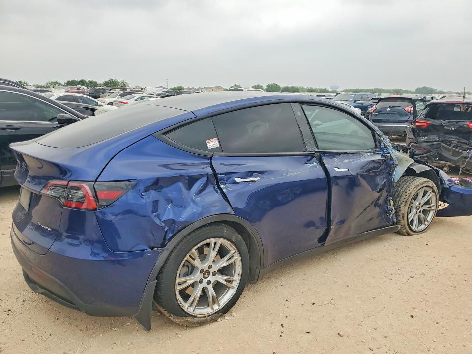 2023 Tesla Model y VIN 7SAYGAEE4PF700515 COPART salvage auction — ALL OVER, Tx - Salvage Vehicle Title, sold $3,350 on 2026-07-16 (photo 3)