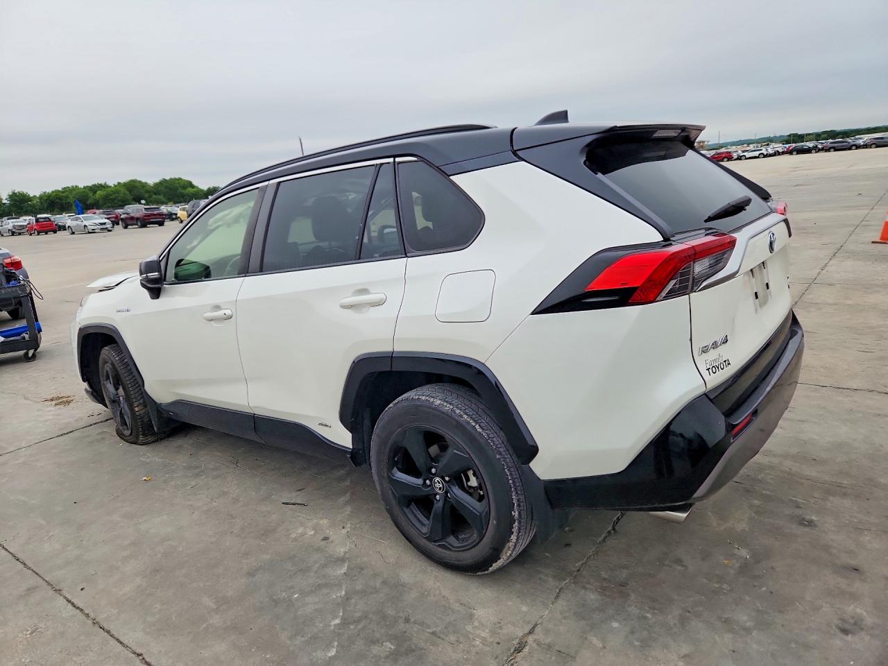 2021 Toyota RAV4 VIN JTME6RFV3MD517884 COPART salvage auction — Side, TX - SALVAGE VEHICLE TITLE, sold $9,800 on 2026-07-02 (photo 2)