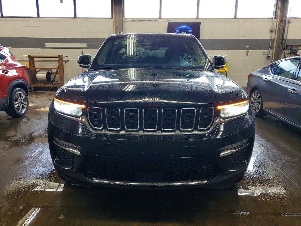2022 Jeep Grand cherokee VIN 1C4RJYB61N8758538 COPART salvage auction — MINOR DENT/SCRATCHES, MO - CERTIFICATE OF TITLE, sold $14,300 on 2026-07-09 (photo 5)