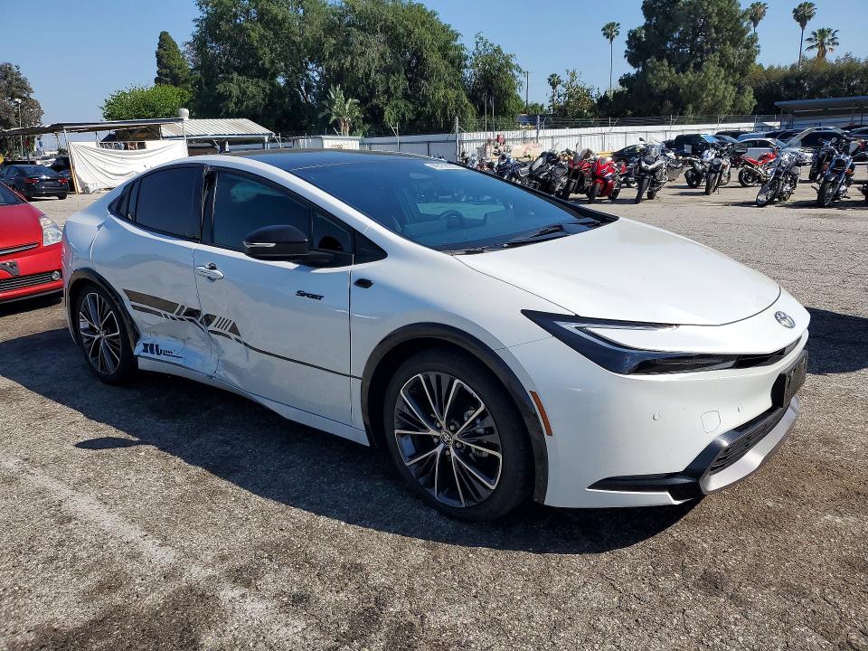 2024 Toyota Prius VIN JTDACAAU8R3038705 COPART salvage auction — SIDE, Ca - Salvage Certificate, sold $10,800 on 2026-07-24 (photo 4)